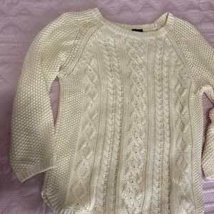 Knitted white sweater